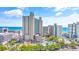 Aerial view of oceanfront resort with pools and beach access at 202 74Th Ave. N # 1249/50, Myrtle Beach, SC 29572