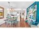Dining area with table, chairs, and view of kitchen at 202 74Th Ave. N # 1249/50, Myrtle Beach, SC 29572