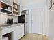Small kitchen with granite countertops and stainless steel appliances at 1600 S Ocean Blvd. # 114, Myrtle Beach, SC 29577