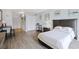 Cozy bedroom with a comfortable bed, hardwood floors, and ample closet space at 1600 S Ocean Blvd. # 114, Myrtle Beach, SC 29577
