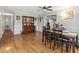 Dining room with hardwood floors and a china cabinet at 1210 John St., Mullins, SC 29574