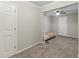 Charming bedroom with carpeted floors and built-in shelving at 1210 John St., Mullins, SC 29574