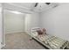 Simple bedroom with carpeted floors and twin bed at 1210 John St., Mullins, SC 29574