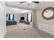 Large main bedroom with carpeted floor and walk-in closet at 1210 John St., Mullins, SC 29574