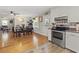 Kitchen with stainless steel appliances, dining area view at 1210 John St., Mullins, SC 29574