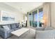 Comfortable living room with ocean view and balcony access at 107 S Ocean Blvd. # 1908, Myrtle Beach, SC 29577