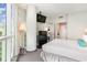 Bedroom with king bed, large window, and ensuite bathroom at 107 S Ocean Blvd. # 1908, Myrtle Beach, SC 29577