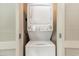 Stackable washer and dryer in a convenient laundry closet at 107 S Ocean Blvd. # 1908, Myrtle Beach, SC 29577