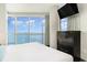 Bedroom with ocean view and large windows at 107 S Ocean Blvd. # 1908, Myrtle Beach, SC 29577