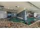 Indoor pool with water features and seating at 107 S Ocean Blvd. # 1908, Myrtle Beach, SC 29577