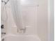 White bathtub and shower with shower curtain at 107 S Ocean Blvd. # 1908, Myrtle Beach, SC 29577