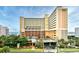 Oceanfront building with multiple levels and parking area at 6900 N Ocean Blvd. # 410, Myrtle Beach, SC 29572