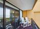 Balcony with two chairs and ocean view at 6900 N Ocean Blvd. # 410, Myrtle Beach, SC 29572