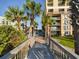 Wooden walkway to resort amenities at 6900 N Ocean Blvd. # 410, Myrtle Beach, SC 29572