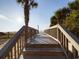 Convenient beach access with boardwalk leading to the sand at 6900 N Ocean Blvd. # 410, Myrtle Beach, SC 29572