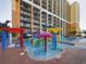 pool with colorful play features at 6900 N Ocean Blvd. # 410, Myrtle Beach, SC 29572