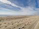 Peaceful beach scene under a bright sky at 6900 N Ocean Blvd. # 410, Myrtle Beach, SC 29572