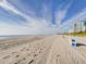 Expansive beach view with footprints in the sand at 6900 N Ocean Blvd. # 410, Myrtle Beach, SC 29572
