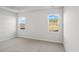 Well-lit bedroom featuring neutral wall paint and carpeted floors at 3030 Deerberry Place, Longs, SC 29568