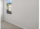 Simple bedroom with window and neutral colored walls at 3030 Deerberry Place, Longs, SC 29568