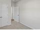 Spacious bedroom with neutral colored walls and carpet at 3030 Deerberry Place, Longs, SC 29568