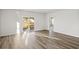 Sunlit living room with sliding glass doors leading to the backyard at 3030 Deerberry Place, Longs, SC 29568