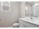 Modern bathroom featuring a white vanity and toilet at 3042 Deerberry Place, Longs, SC 29568