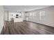 Spacious living room with hardwood floors and lots of natural light at 3042 Deerberry Place, Longs, SC 29568