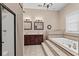 Elegant bathroom with double vanity, soaking tub, and shower at 3712 Faith Dr., Conway, SC 29527