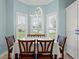 Kitchen nook with glass table and view to backyard at 3712 Faith Dr., Conway, SC 29527