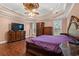 Main bedroom with tray ceiling, hardwood floors, and large windows at 3712 Faith Dr., Conway, SC 29527