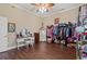 Spacious bedroom with built in shelving and wood floors at 3712 Faith Dr., Conway, SC 29527