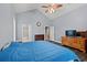 Main bedroom with a large bed, dresser, and en-suite bathroom access at 3712 Faith Dr., Conway, SC 29527