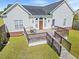 Large deck with seating area, perfect for entertaining at 3712 Faith Dr., Conway, SC 29527