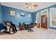 Game room with a massage chair, game table, and access to the backyard at 3712 Faith Dr., Conway, SC 29527