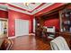 Bright home office features built-in shelving and hardwood floors at 3712 Faith Dr., Conway, SC 29527