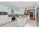 Modern kitchen with white cabinets, granite counters, and an island at 3712 Faith Dr., Conway, SC 29527