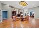 Spacious living room with hardwood floors and built-in shelving at 3712 Faith Dr., Conway, SC 29527