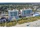 Aerial view of two beachfront high-rise buildings with a pool and beach access at 1903 S Ocean Blvd. S # 708, North Myrtle Beach, SC 29582