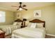 Two twin beds, ceiling fan, and ocean decor at 1903 S Ocean Blvd. S # 708, North Myrtle Beach, SC 29582