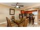 Dining room with glass-top table and wicker chairs at 1903 S Ocean Blvd. S # 708, North Myrtle Beach, SC 29582