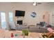 Open concept living room with fireplace and access to kitchen at 2013 Great Blue Heron Dr., Little River, SC 29566