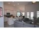 Open floor plan boasting a spacious kitchen island and adjacent living area at 2013 Great Blue Heron Dr., Little River, SC 29566