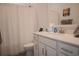Clean bathroom with white vanity, shower, and updated fixtures at 2013 Great Blue Heron Dr., Little River, SC 29566