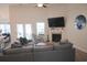 Spacious living room with fireplace and built-ins at 2013 Great Blue Heron Dr., Little River, SC 29566