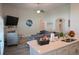 Spacious living room with a fireplace and built-in shelving at 2013 Great Blue Heron Dr., Little River, SC 29566