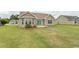 Spacious backyard showcasing a home's exterior and landscaping at 333 Carolina Springs Ct., Conway, SC 29527