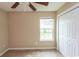 Bright bedroom featuring a large window and closet at 333 Carolina Springs Ct., Conway, SC 29527
