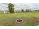 Large backyard with fire pit and shed at 333 Carolina Springs Ct., Conway, SC 29527