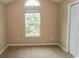 Simple bedroom with vaulted ceiling and window at 333 Carolina Springs Ct., Conway, SC 29527